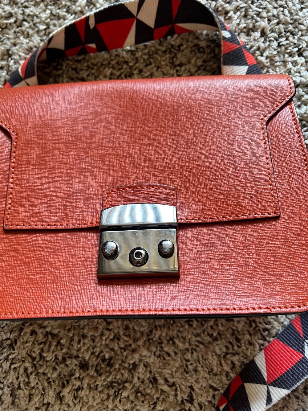 Vera Pelle Orange Crossbody with Geometric Pattern Strap